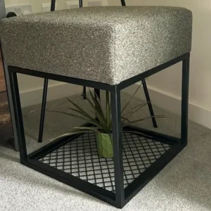 black metal footstool, mesh shelf